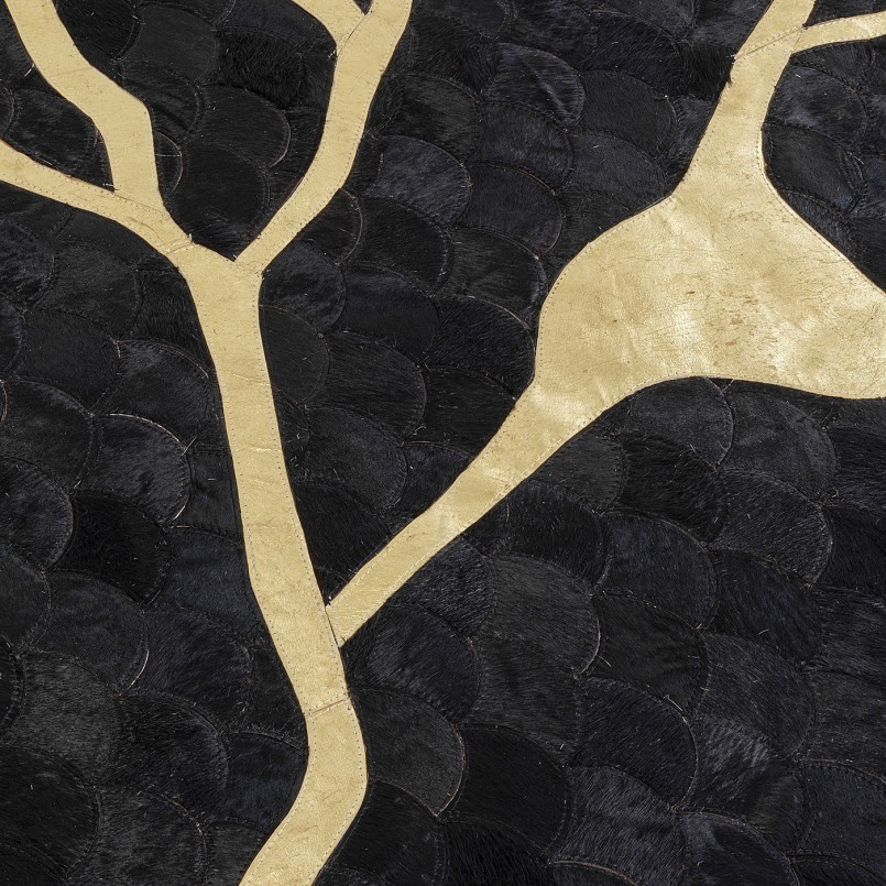 Tapis noir et doré en peau de vache - Fulmine - Kare Design