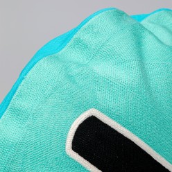 Coussin Icon croix turquoise et noir Kare Design