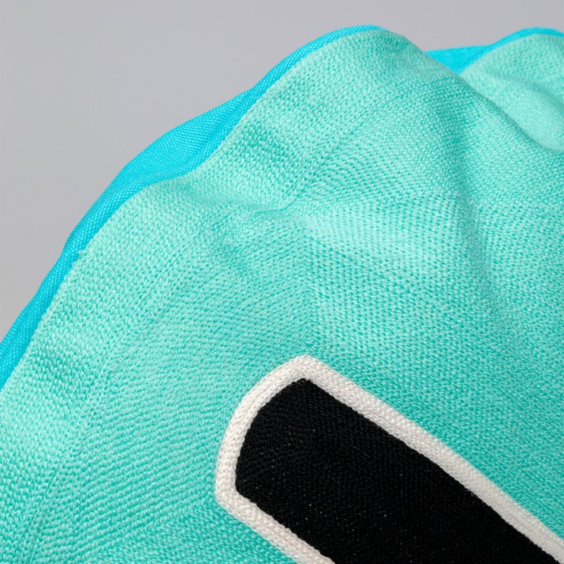 Cushion Icon cross turquoise and black Kare Design